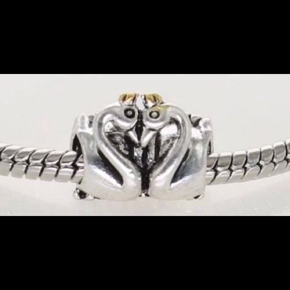 Authentic Retired Pandora swan embrace charm.